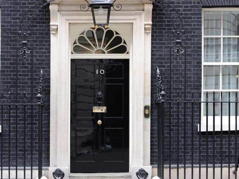 An image of the door of 10 Downing Street