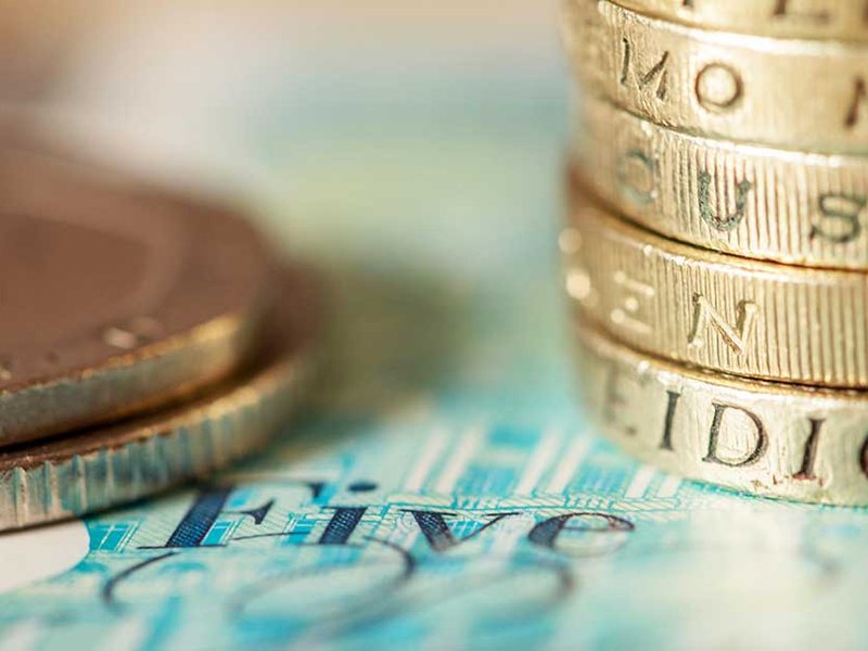 money-in-a-pile-and-blue-five-pound.jpg