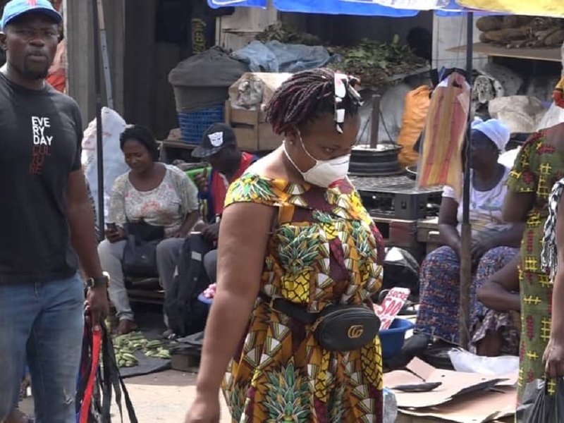 woman_wearing_a_surgical_mask_in_brazzaville_-_covid_19.jpg